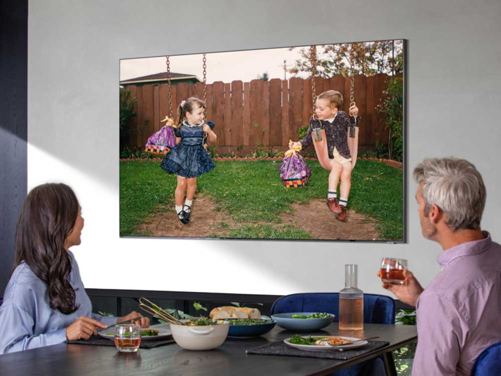 white bathtub in bathroom and lutron shades