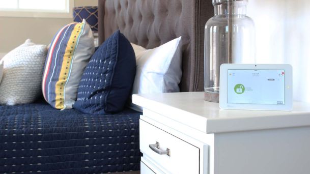 qolsys touchpad on nightstand by bed