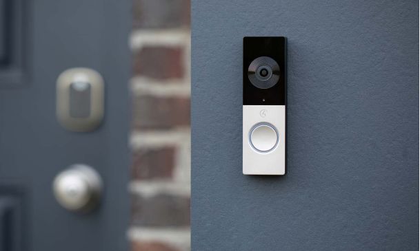 Control4 chime doorbell on blue wall