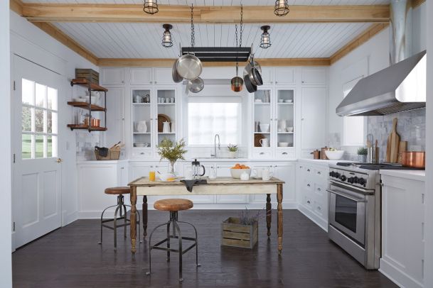 White kitchen with hanging pots lutron imagery