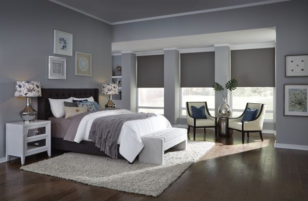 Bedroom with blackout shades from lutron