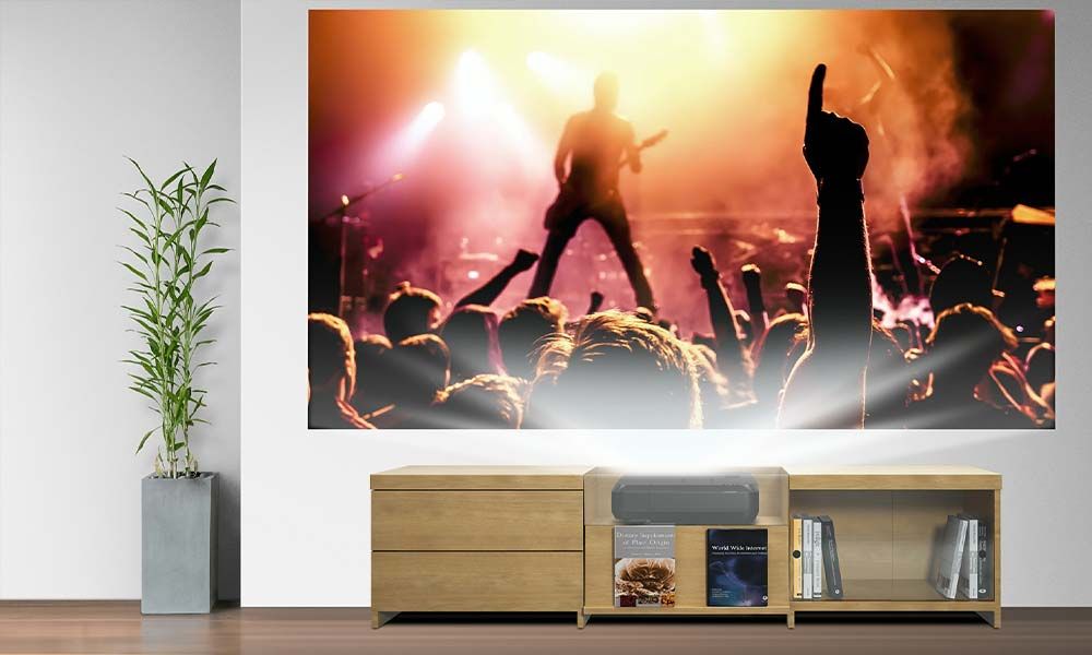 Epson, projector showing screen with rock concert